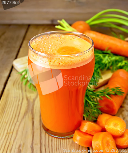 Image of Juice carrot with leaf on board