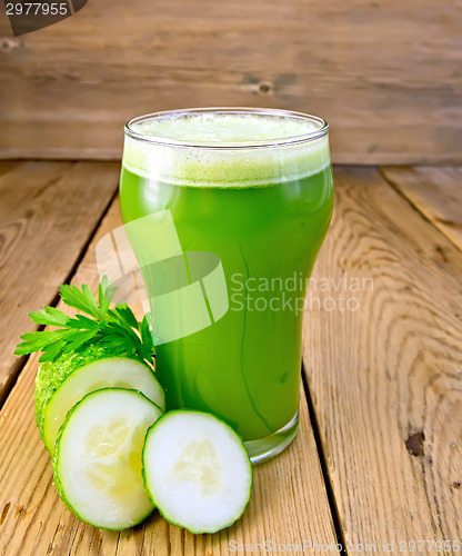 Image of Juice cucumber in glass on board