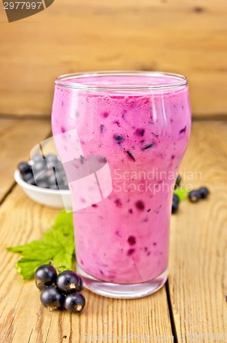 Image of Milkshake with black currants on board