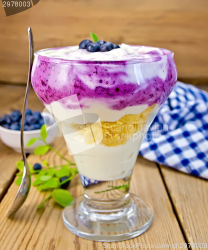 Image of Dessert milk with blueberries on board