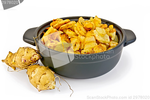 Image of Jerusalem artichokes roasted in pan