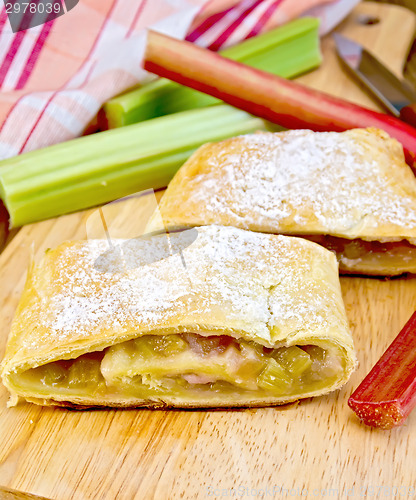 Image of Strudel with rhubarb and napkin on board