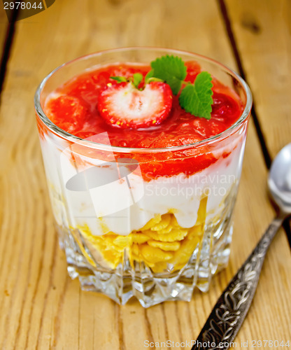 Image of Dessert milk with strawberry and flakes in glass