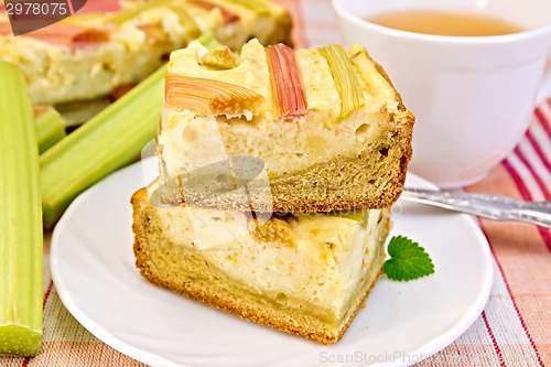 Image of Pie with curd and rhubarb on tablecloth