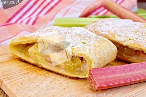 Image of Strudel with rhubarb on linen tablecloth