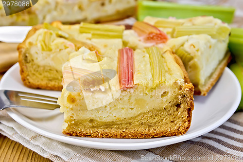 Image of Pie with curd and rhubarb on napkin