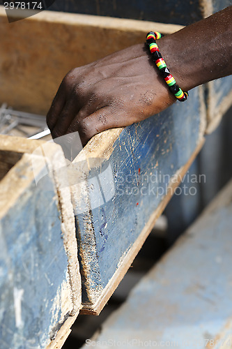 Image of Hand of a Ghanaian at a shop