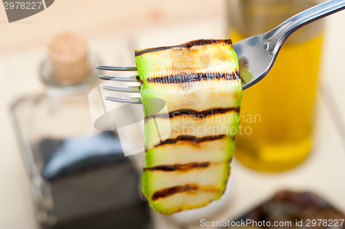 Image of grilled zucchini courgette on a fork