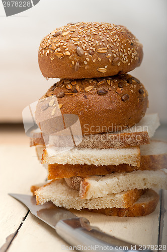 Image of organic bread over rustic table