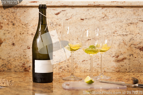 Image of White Wine Bottle with Two Wine Glasses