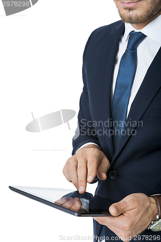 Image of Businessman using a tablet computer