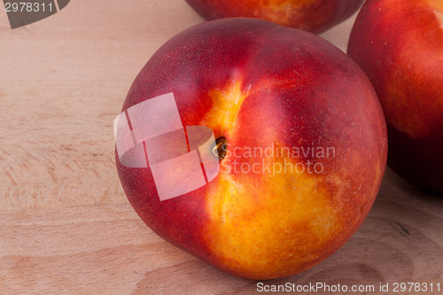 Image of Three tasty fresh ripe juicy nectarines