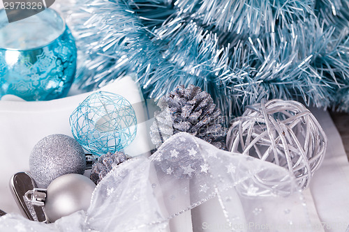 Image of Stylish blue and silver Christmas table setting