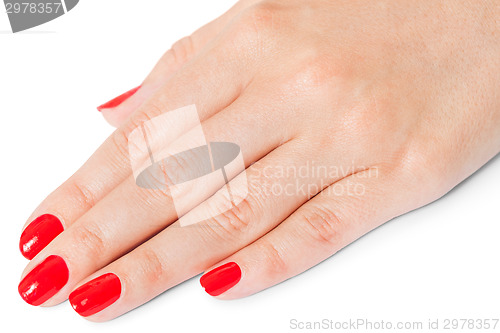 Image of Woman with beautiful manicured red fingernails