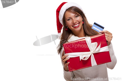 Image of Woman holding a Christmas gift and bank card