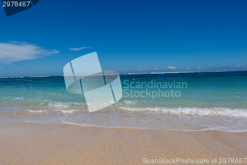 Image of Beautiful tropical beach with lush vegetation