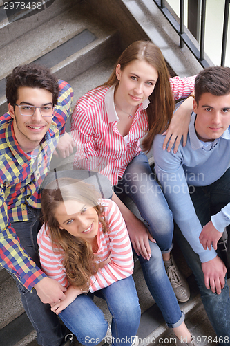 Image of happy teens group in school