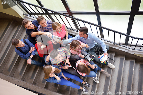 Image of happy teens group in school