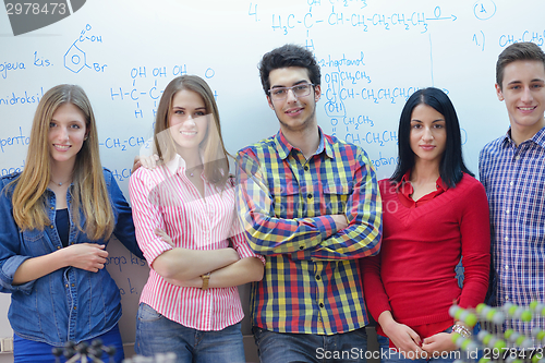 Image of happy teens group in school