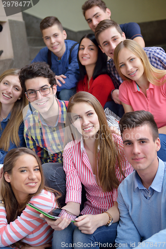 Image of happy teens group in school