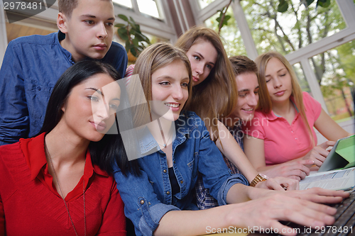 Image of happy teens group in school