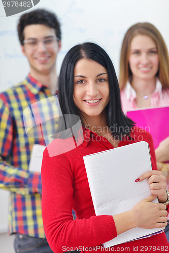 Image of happy teens group in school