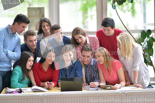 Image of happy teens group in school