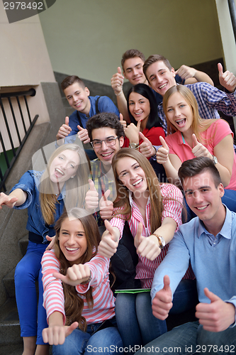 Image of happy teens group in school