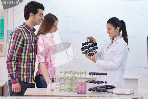 Image of happy teens group in school