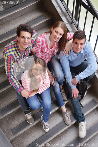 Image of happy teens group in school