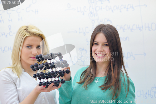 Image of happy teens group in school