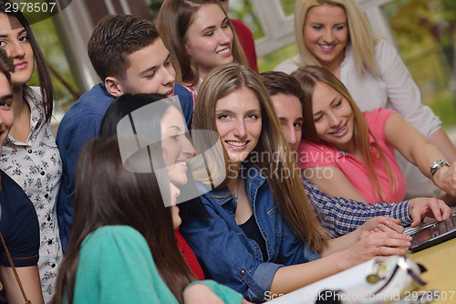 Image of happy teens group in school