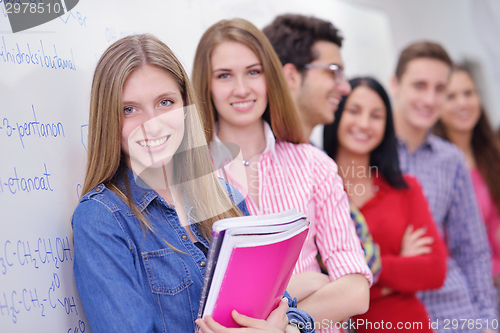 Image of happy teens group in school