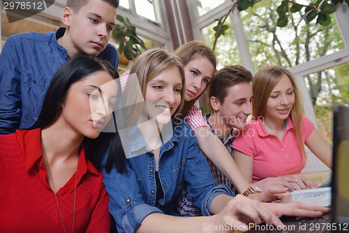 Image of happy teens group in school