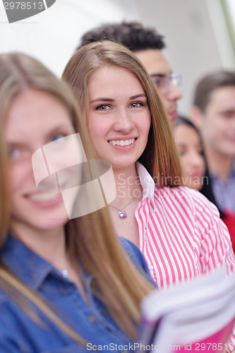 Image of happy teens group in school