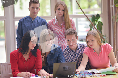 Image of happy teens group in school