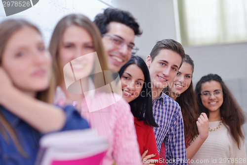 Image of happy teens group in school