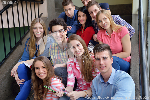 Image of happy teens group in school