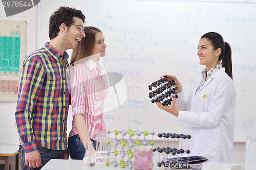 Image of happy teens group in school