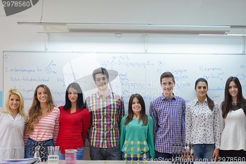 Image of happy teens group in school