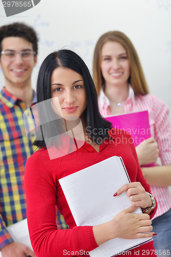 Image of happy teens group in school