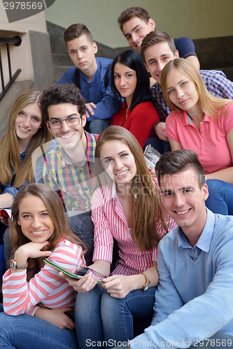 Image of happy teens group in school