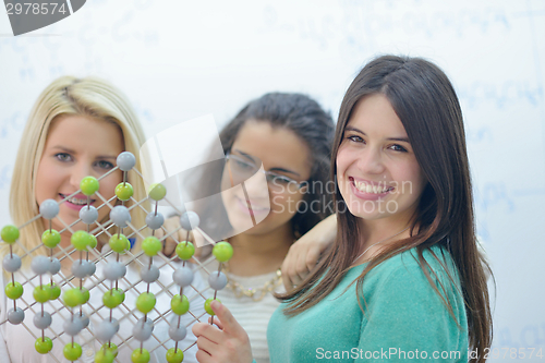 Image of happy teens group in school