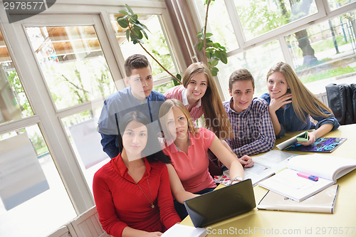 Image of happy teens group in school