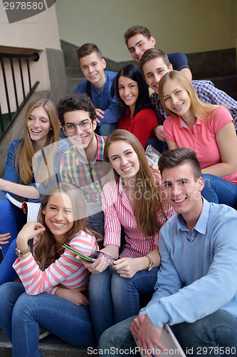 Image of happy teens group in school