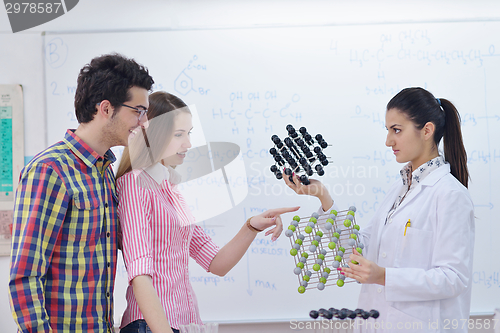 Image of happy teens group in school