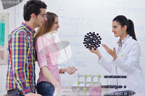 Image of happy teens group in school