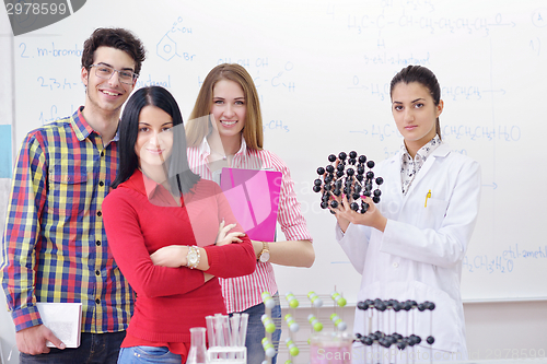 Image of happy teens group in school