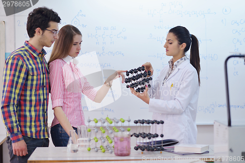 Image of happy teens group in school