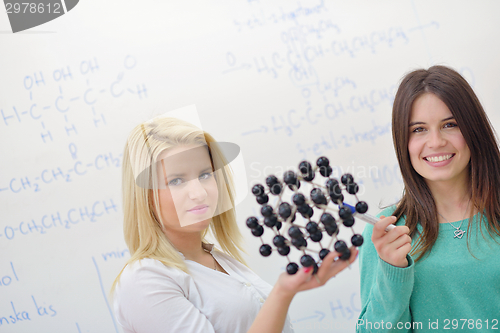 Image of happy teens group in school